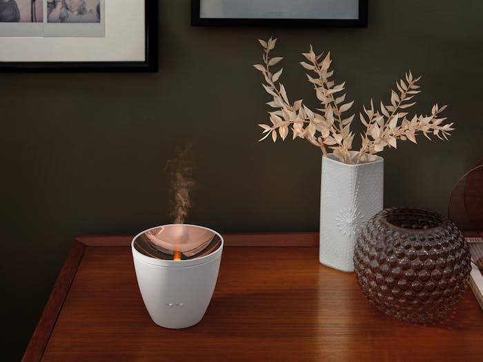 Zoe aroma diffuser by Stadler Form in white as decoration on a sideboard