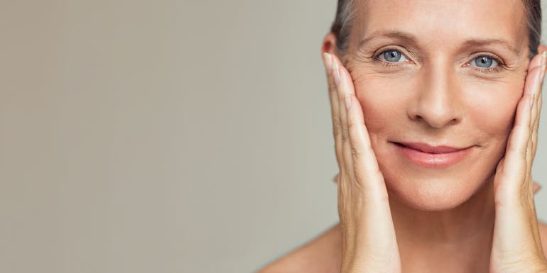 A woman who is smiling with beautiful skin A woman who is smiling with beautiful skin