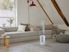 Oliver humidifier by Stadler Form in a livingroom area