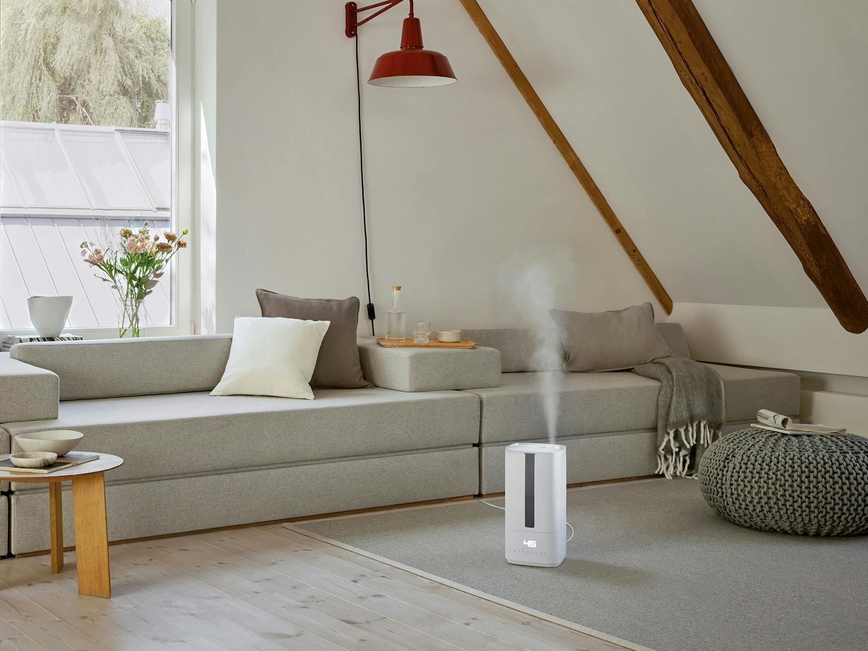 Oliver humidifier by Stadler Form in a livingroom area