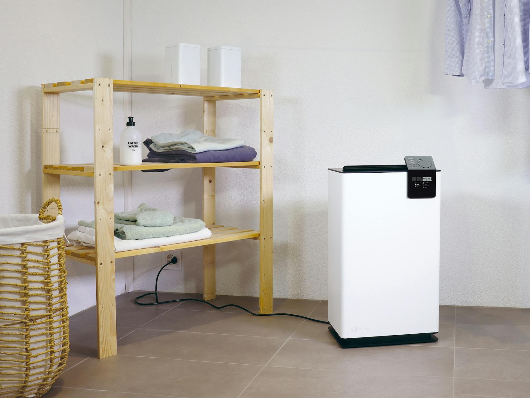 Albert dehumidifier by Stadler Form in the laundry room