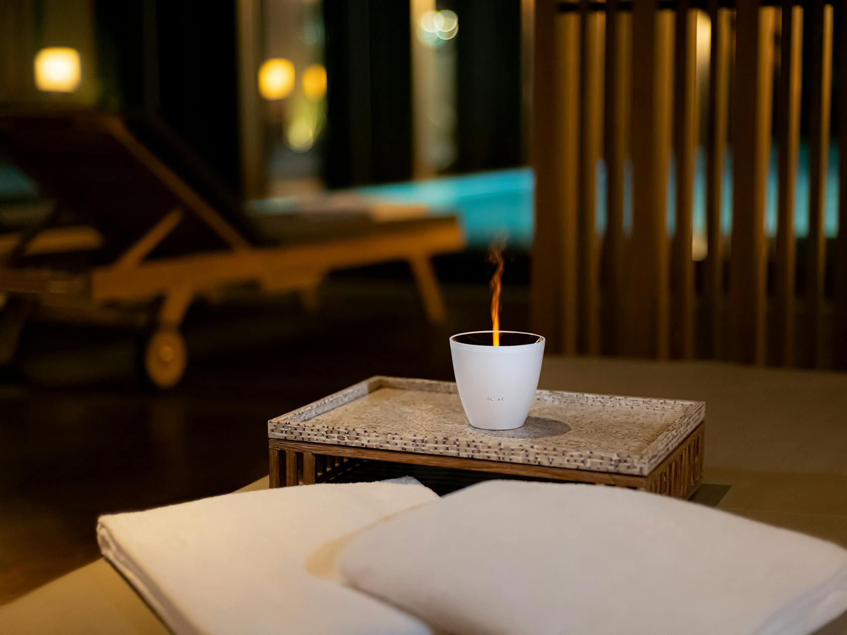 Zoe aroma diffuser by Stadler Form in white in a spa