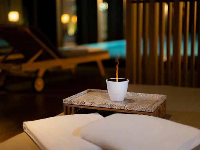 Zoe aroma diffuser by Stadler Form in white in a spa