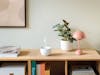 Jasmine mobile aroma diffuser in white on a sideboard