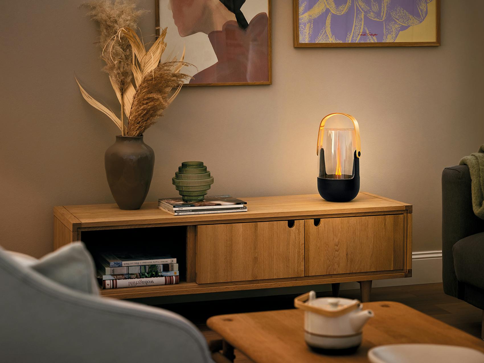Sophie aroma diffuser and lantern from Stadler Form on a sideboard