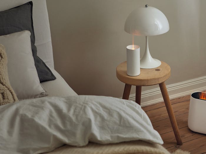 Lucy aroma diffuser by Stadler Form in white in a bedroom