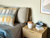 Zoe mobile aroma diffuser in white on a bedside table