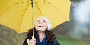 Women with yellow umbrella