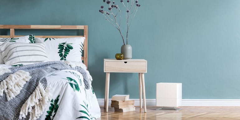 Stadler Form Oskar white next to the bed Stadler Form Oskar white next to the bed