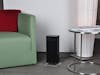 Anna heater by Stadler Form in black Anna heater by Stadler Form in black in a living room