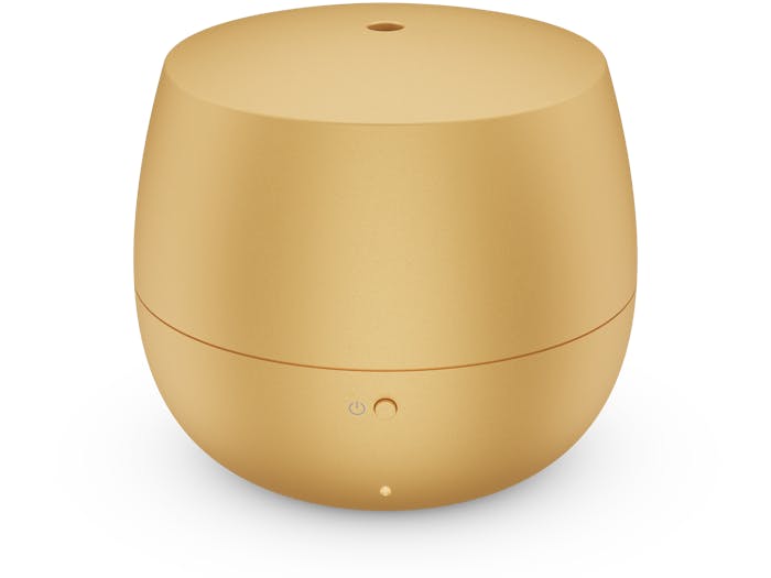 Mia aroma diffuser by Stadler Form in gold as perspective view