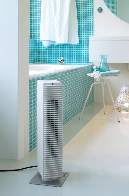 Paul heater by Stadler Form in white in a bathroom